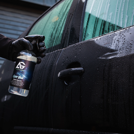 Applying Auto Glanz Aqua Seal to a wet car for instant hydrophobic protection.